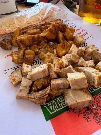 Chicharrones with beer at a traditional Seville bar