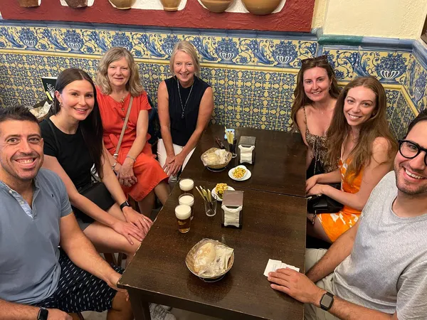 Elio and tour group enjoying tapas in Seville