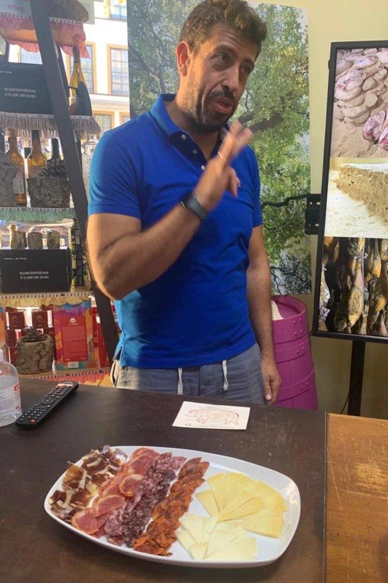 Guide presenting a tapas plate
